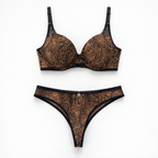 Yılan desenli push-up sütyen ve string külot takımı. Güçlü, feminen ve sofistike tasarım. Online mağazada şimdi keşfedin.