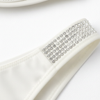 Taş işlemeli kumaşın doku detayı