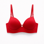 Kıyafet altında iz yapmayan pürüzsüz yüzeyli kırmızı toparlayıcı sütyen. Gün boyu konfor ve güçlü destek bir arada.