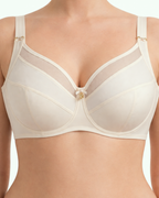 Ekru renk büyük beden destekli sütyen; sade tasarım, güçlü destek ve gün boyu konfor sunar.